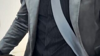 Classy vest and shiny silver blazer combo with two gay guys