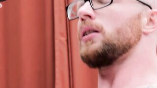 Bald muscular guy with glasses barebacked hard outdoors
