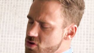 CEO wears a suit and tie and fucks a buff guy in a jacuzzi