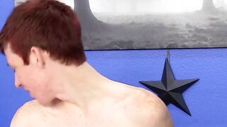 Cutie jerks off on the bed while holding a large dildo inside of him
