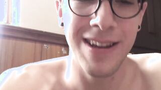 Tattooed Latino jock wears seductive glasses during hot BJ