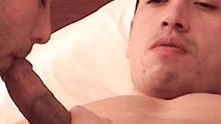 Athletic hunk gets a passionate cock sucking while moaning