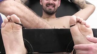 Tattooed amateur endures feet ticking from a mature master