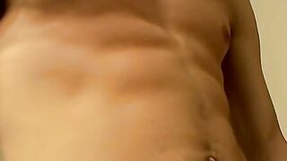 Straight athletic dude strokes his hairy cock and cums