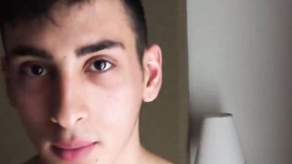 Cute Latino man swallows after a brief banter with another male