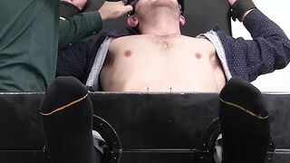 Bound and blindfolded hunk Sean Holmes endures feet tickling