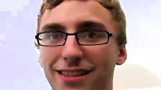 Geeky amateur with glasses and tattoos strokes his big cock