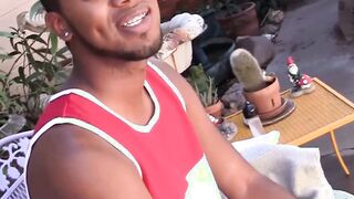 Youthful black person flaunts his balls and jerks off performance