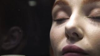 Beautiful strapped redhead squirting on a magic wand