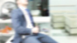 Intern plays with suit of his boss and gets caught doing it