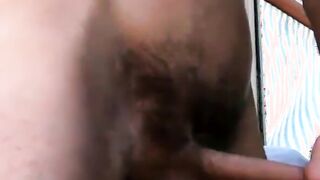 Tiny amateur strips naked after sunbathing and masturbates
