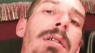 Rough stud smokes during an interview and masturbates solo