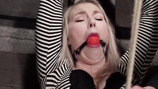 Gagged blonde slave crotch roped over tights