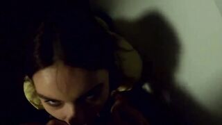The women give a oral sex on a outdoors balcony, and then walks with a cum on her face