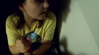 The women give a oral sex on a outdoors balcony, and then walks with a cum on her face