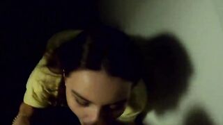 The women give a oral sex on a outdoors balcony, and then walks with a cum on her face