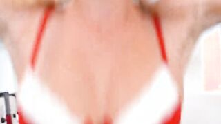 Making Santa happy at the gym using big boobies