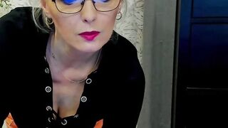 German MILF posing in mini skirt on webcam