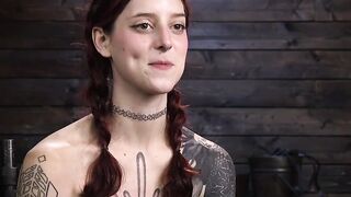 Tattooed bound babe whipped and gagged with a dick on a stick