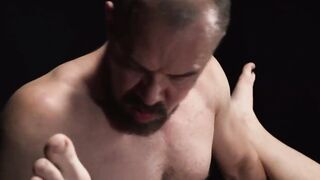 Danny Wilcoxx's smooth and sexy ass with his balls hanging from behind waiting to be