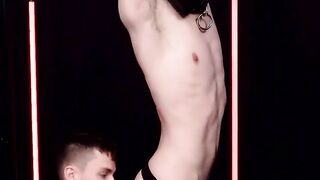 Ethan Tate arches his back to give his captor more access to his pucker for rimming