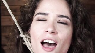 Brunette tied in chair and tormented
