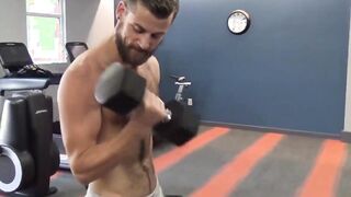 Hairy Mars Rousseau in his jockstrap strokes his massive cock and cums in front of th