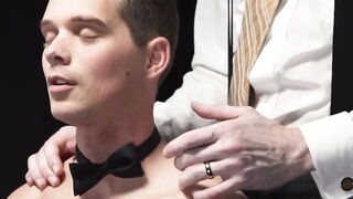 Master Anthony Divino bends the boy over before running his fingers along his hole