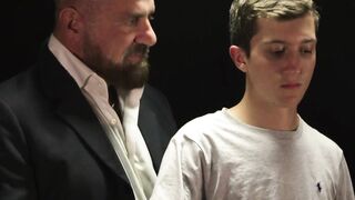 Felix Kamp presses the boy's moaning mouth into his bulging groin after fingering his