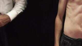Felix Kamp presses the boy's moaning mouth into his bulging groin after fingering his