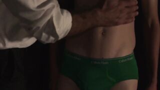 Felix Kamp presses the boy's moaning mouth into his bulging groin after fingering his