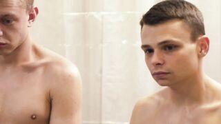 Three young boys helped one another in massaging their dicks in an orgy sex