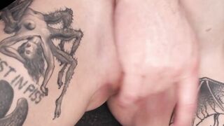 Tattooed slave tied to a column