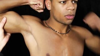 Touching the muscles of a teen black boy by EastBoys