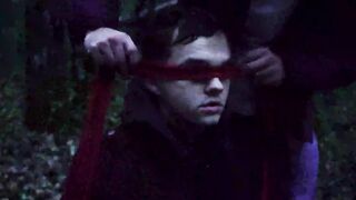 Logan Cross touched  the tip of the apprentice's penis with his tongue and knelt to a