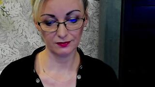 Blonde MILF takes off bra on webcam