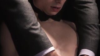 The slave boy in his jockstrap works on his master's rock-hard cock as per his master