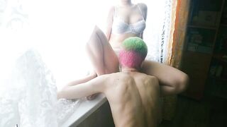 Licking juicy vagina on the windowsill