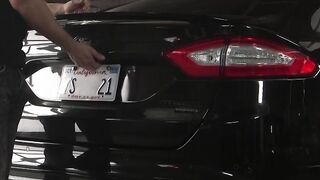 Brunette face fucked in a trunk