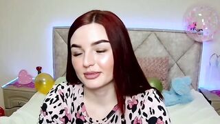 Cute redhead babe chats on webcam