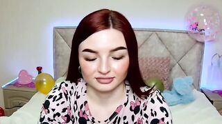Cute redhead babe chats on webcam