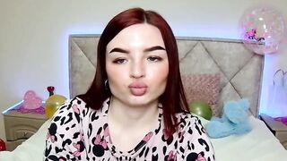 Cute redhead babe chats on webcam