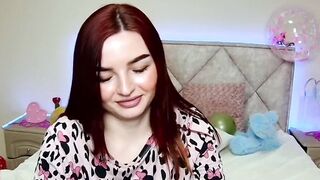 Cute redhead babe chats on webcam
