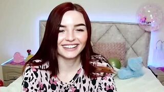 Cute redhead babe chats on webcam