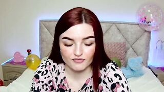 Cute redhead babe chats on webcam