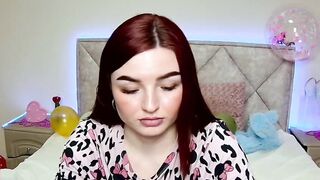 Cute redhead babe chats on webcam