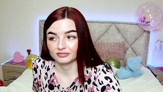 Cute redhead babe chats on webcam