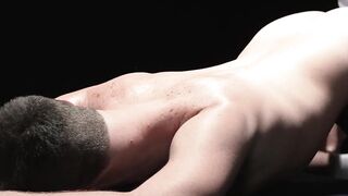Master Felix Kamp slides a dildo onto the boy's tight hole while he handjobs his dick