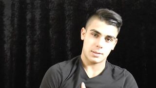 Muscular boy massages his muscles by EastBoys