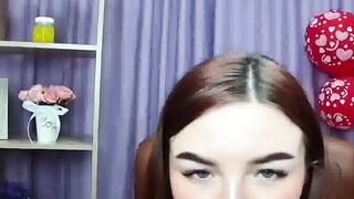 Redhead babe flashes big natural tits